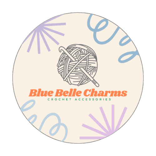 Logo of Blue Belle Charms with a ball of yarn and crochet hook on a circular background.