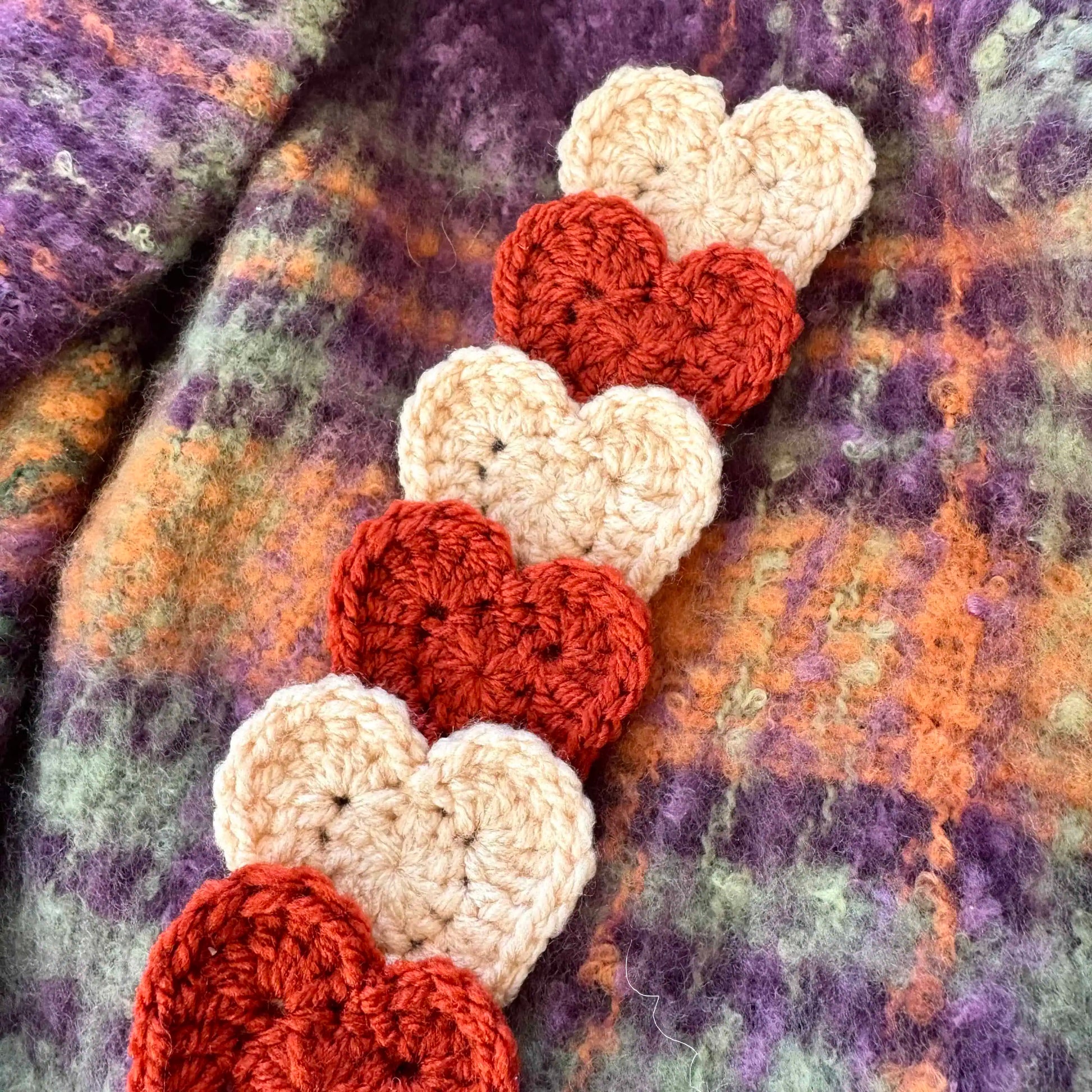 Crocheted hearts bookmark in red and beige